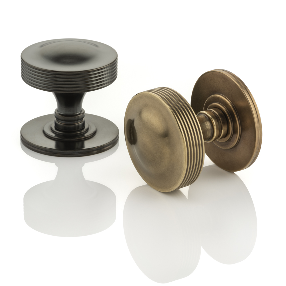solid brass door knobs in dark bronze waxed and mid antique waxed finish